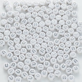 BD00104-02-silver-letter-white-opaque-coin-alphabet-beads-single-u-4×7mm